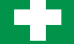 White cross on green background